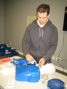 Applying AED pads during firs aid CPR